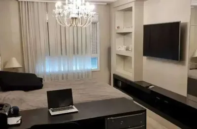 Apartamento mobiliado com 4 suítes e 3 vagas de garagem na meia praia em itapema