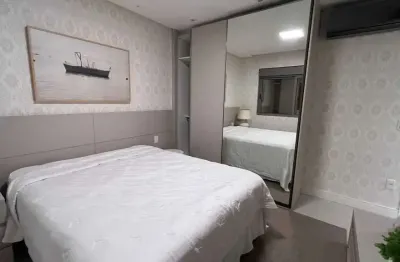 Frente mar mobiliado com 4 suítes sendo 1 master e 3 vagas de garagem em balneário camboriú/sc