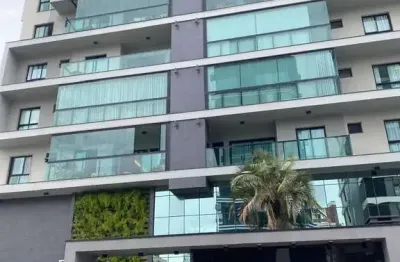 Apartamento com 1 suíte + 2 demi-suítes e 2 vagas de garagem na praia brava em itajaí