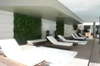 Apartamento frente mar mobiliado com 4 suítes e 3 vagas de garagem em itapema