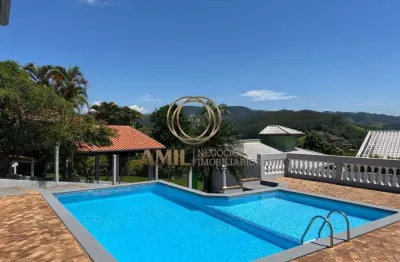 Chácara com casa térrea, 03 dormitórios 02 suites, 1.718,20m², piscina e pomar, jambeiro
