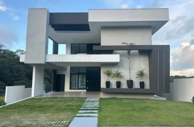 Excelente casa com 4 suítes finamente decorada no Alphaville Litoral Norte 3