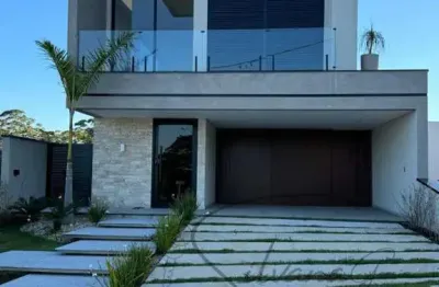 Casa á venda no condominio bella citta com 4 súites sendo
