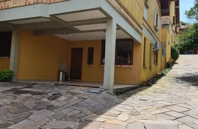 Casa em condomínio fechado com 3 quartos para alugar na Rua Edgar Luiz Schneider, 54, Jardim Isabel, Porto Alegre