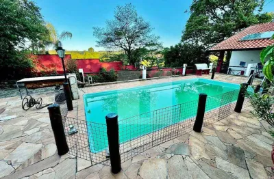 Casa com 4 dormitórios à venda, 300 m² por R$ 2.500.000,00 - Parque Jatibaia (Sousas) - Campinas/SP