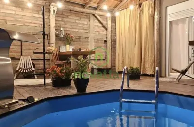 Casa em condomínio fechado com 3 quartos à venda na rua christiano zimmermann, 120, feitoria, são leopoldo por r$ 655.000