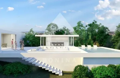 Casa de vidro com ambientes amplos e sofisticados, descubra a exclusividade e o luxo no condomínio terras de são josé ii em itu