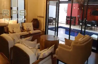 Casa de alto padrão para venda na vila giglio em atibaia, 03 suítes com closet, amplas salas e área gourmet completa integrada com piscina e spa.