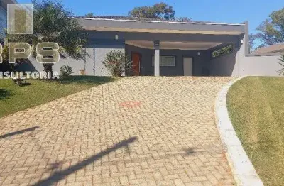 Casa totalmente térrea à venda no condomínio porto atibaia, 3 quartos sendo 3 suítes, 6 banheiros, 4 vagas de garagem, lazer completo