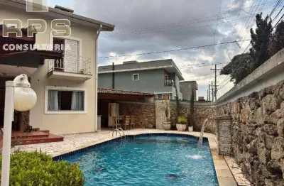 Casa para locação e venda na vila petrópolis em atibaia, 3 quartos sendo 1 suíte, escritório, área de lazer com piscina, espaço gourmet e jardim!