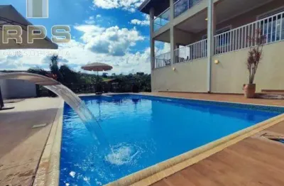 Casa de campo em condomínio de chácaras em atibaia, com 06 suítes, piscina climatizada, área gourmet, playground, enorme varanda e muito verde!
