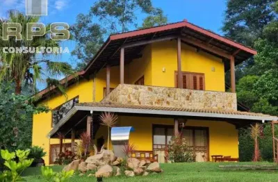 Casa a venda no condomínio palavra da vida com 3 suítes e piscina climatizada, área gourmet com churrasqueira, vaga para 08 carros, portaria 24hrs