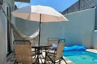 Casa a venda semibiliada , com 3 dormitórios sendo 1 suíte, cozinha , sala, 02 banheiros ,jardim de inverno área gourmet com piscina e churrasqueira
