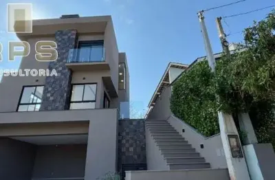 Casa alto padrão no terras de atibaia, 2 suítes e quarto reversível com banheiro completo, área de lazer completa, sala e cozinha em conceito aberto.