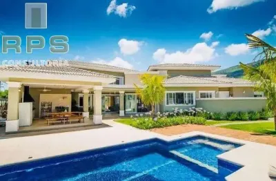 Casa totalmente térrea no condomínio flamboyant, com 5 suítes, repleta de salas,  área de lazer! oportunidade incrivel