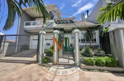 Casa com 3 quartos à venda na rua dinamarca, moinhos de vento, canoas, 276 m2 por r$ 1.650.000