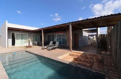 Casa mobiliada de 3 quartos com suíte em condomínio beira mar - são miguel do gostoso.