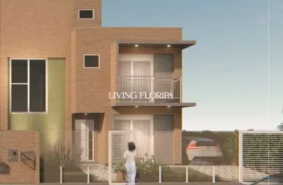 Casa com 3 quartos à venda na rua ipê rosa, 637, carianos, florianópolis por r$ 940.000