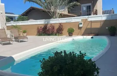 Casa em condomínio fechado com 4 quartos à venda na travessa da liberdade, 211, campeche, florianópolis por r$ 4.990.000