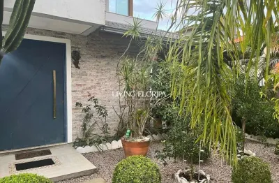 Casa com 4 quartos à venda na servidão dos artistas, 223, rio tavares, florianópolis por r$ 2.994.000