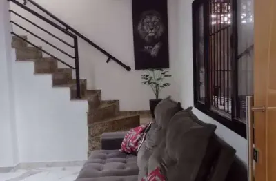 Casa sobrado 3 suites área gourmet 2 vagas de garagem guilhermina praia