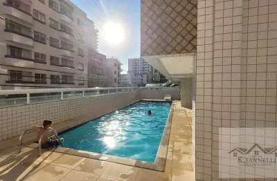 Apartamento 2 dormitórios 1 suíte na guilhermina 100 mts da orla da praia .
