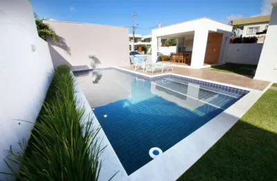 Casa em condomínio fechado com 4 quartos à venda na rua alameda humaitá, t, guarajuba, camaçari por r$ 2.400.000