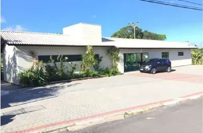 Casa em condomínio fechado com 5 quartos à venda na avenida santos dumont km, estrada do coco, lauro de freitas, 600 m2 por r$ 2.630.000