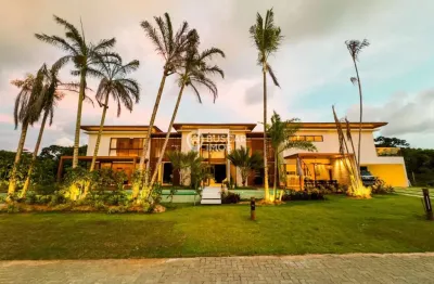 Casa em condomínio fechado com 5 quartos à venda na praia do forte, praia do forte, mata de são joão, 654 m2 por r$ 4.850.000