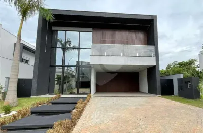 Casa  para alugar com 4 quartos, sendo 4 suítes,  no condomínio alphaville nova esplanada 1, votorantim - sp