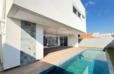 Casa  à venda com 4 quartos, sendo 4 suítes,  no condomínio alphaville nova esplanada 1, votorantim - sp