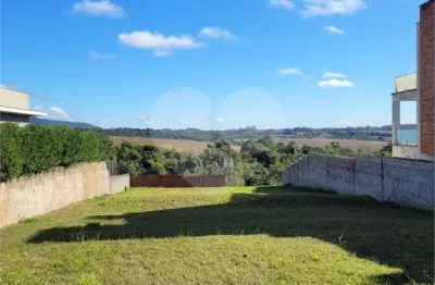 Terreno à venda no condomínio village ipanema 1, araçoiaba da serra - sp