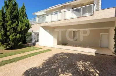 Casa a venda no condominio swiss park com 3 suites, piscina aquecida e varanda gourmet