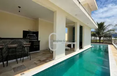 Casa com 4 dormitórios à venda, 518 m² por r$ 3.500.000,00 - condomínio flora rica - peruíbe/sp