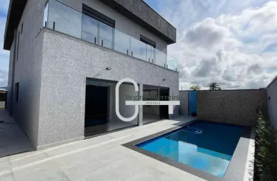 Casa com 4 dormitórios à venda, 262 m² por r$ 2.000.000,00 - condomínio flora rica - peruíbe/sp