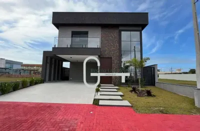 Casa com 4 dormitórios à venda, 262 m² por r$ 2.000.000,00 - condomínio flora rica - peruíbe/sp