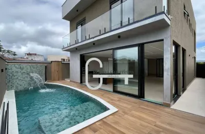 Casa com 4 dormitórios à venda, 267 m² por r$ 2.200.000,00 - condomínio flora rica - peruíbe/sp