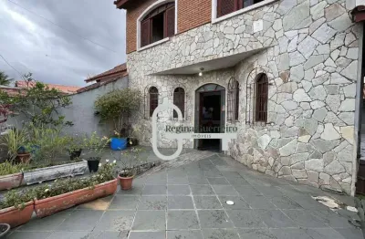 Casa com 4 dormitórios à venda, 217 m² por R$ 1.060.000,00 - Estância Balneária Belmira Novaes - Peruíbe/SP