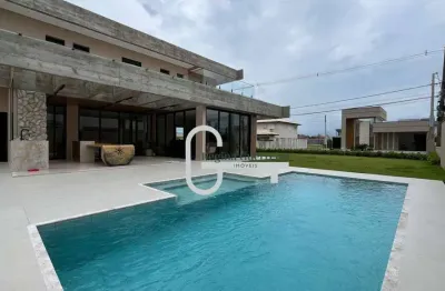 Casa com 5 dormitórios à venda, 290 m² por R$ 2.900.000,00 - Condomínio Flora Rica - Peruíbe/SP