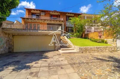 Casa com 5 quartos à venda na rua primeiro de março, 721, partenon, porto alegre, 417 m2 por r$ 1.149.000