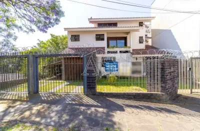 Casa com 3 quartos à venda na rua manoel antônio de magalhães, 40, medianeira, porto alegre, 258 m2 por r$ 980.000