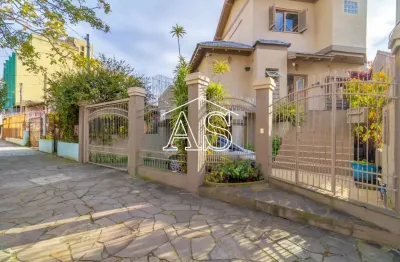 Casa com 4 quartos à venda na rua portuguesa, 326, partenon, porto alegre, 267 m2 por r$ 899.000