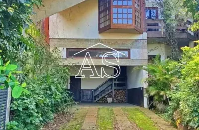 Casa com 5 quartos à venda na avenida guaíba, 4556, vila assunção, porto alegre, 349 m2 por r$ 1.800.000