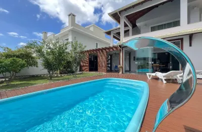 L# casa com 3 dormitorios de 2 suites mobilada com piscina e área gourmet