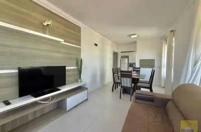 Amplo apto 02 dormitórios mobiliado sacada de frente,  a poucos metros do mar e calçadão.