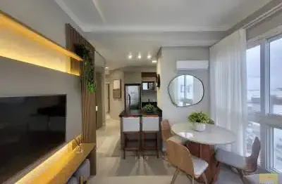 Apartamento 02 dormitórios decorado, predio com infraestrutura completa, na região dos navegantes em capão!