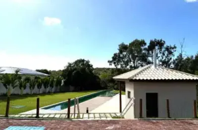 Terreno em condomínio fechado à venda na BA 099, Catu de Abrantes, Camaçari