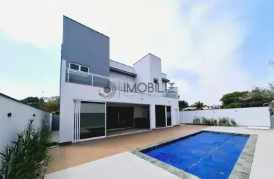 Casa com quatro suítes no condomínio santa clara em indaiatuba.