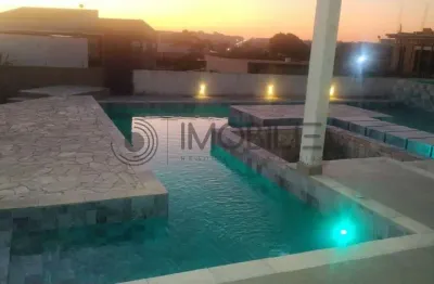 Elegante casa térrea 598m² com 3 suítes, piscina e área gourmet no condomínio terras de mont serrat em salto sp