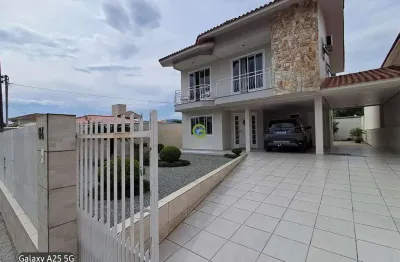 Casa com 3 quartos à venda na rua graciliano carlos de quadros, 64, centro, palhoça, 209 m2 por r$ 1.040.000